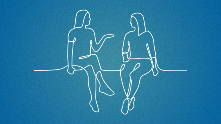 Two people talking